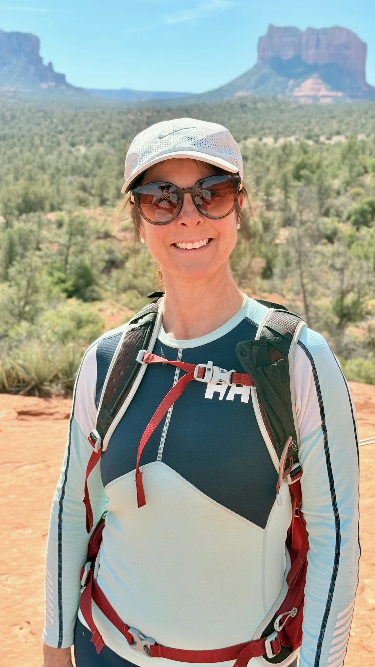 Sophie Callander hiking outdoors on a sunny trail